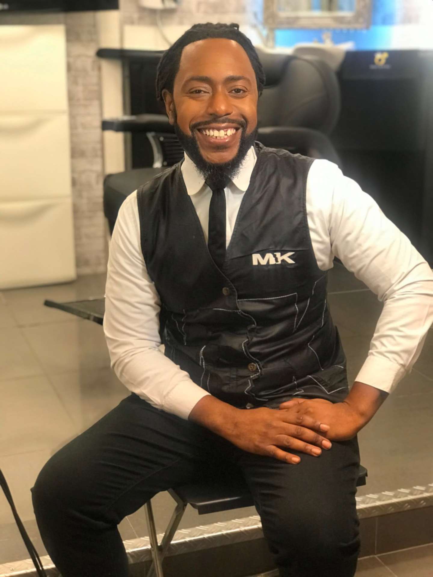 Mucktaru "Grand Master Barber MK" Kargbo in the Afro Elevation Studio